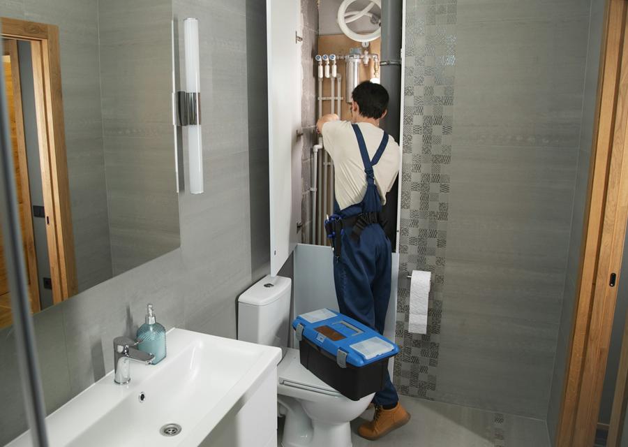 Plumber repairing a bathroom